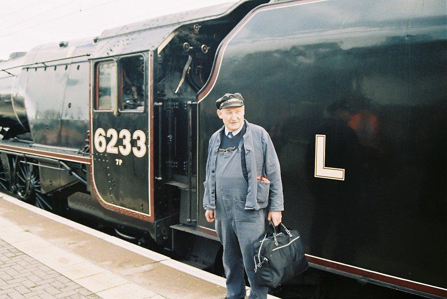 6233 Duchess of Sutherland in black at Newcastle with her driver. 30/09/2010. 