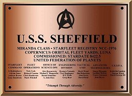 Dedication plaque of U.S.S. Sheffield by the Port Doors on the Bridge. Click on the image for a larger view.